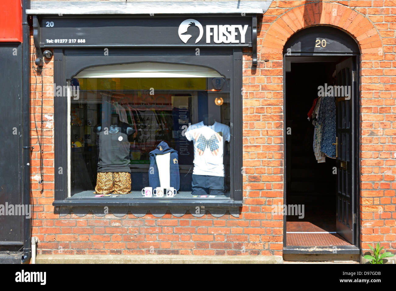 The only way is Essex TOWIE television reality show cast member Joey Donald Essex retail business Fusey shop front window Brentwood Essex England UK Stock Photo