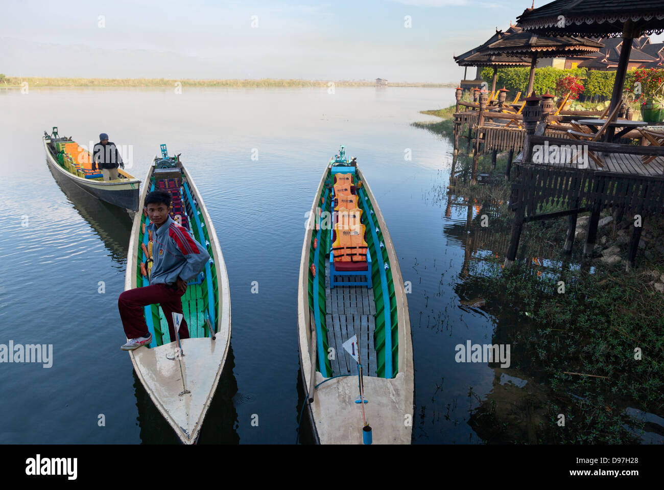 Boats moored by the Lake Inle Resort at sunset, Myanmar 2 Stock Photo