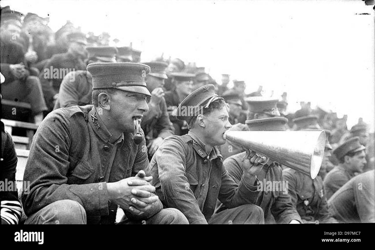 This image captures spectators at a military athletic tournament held ...