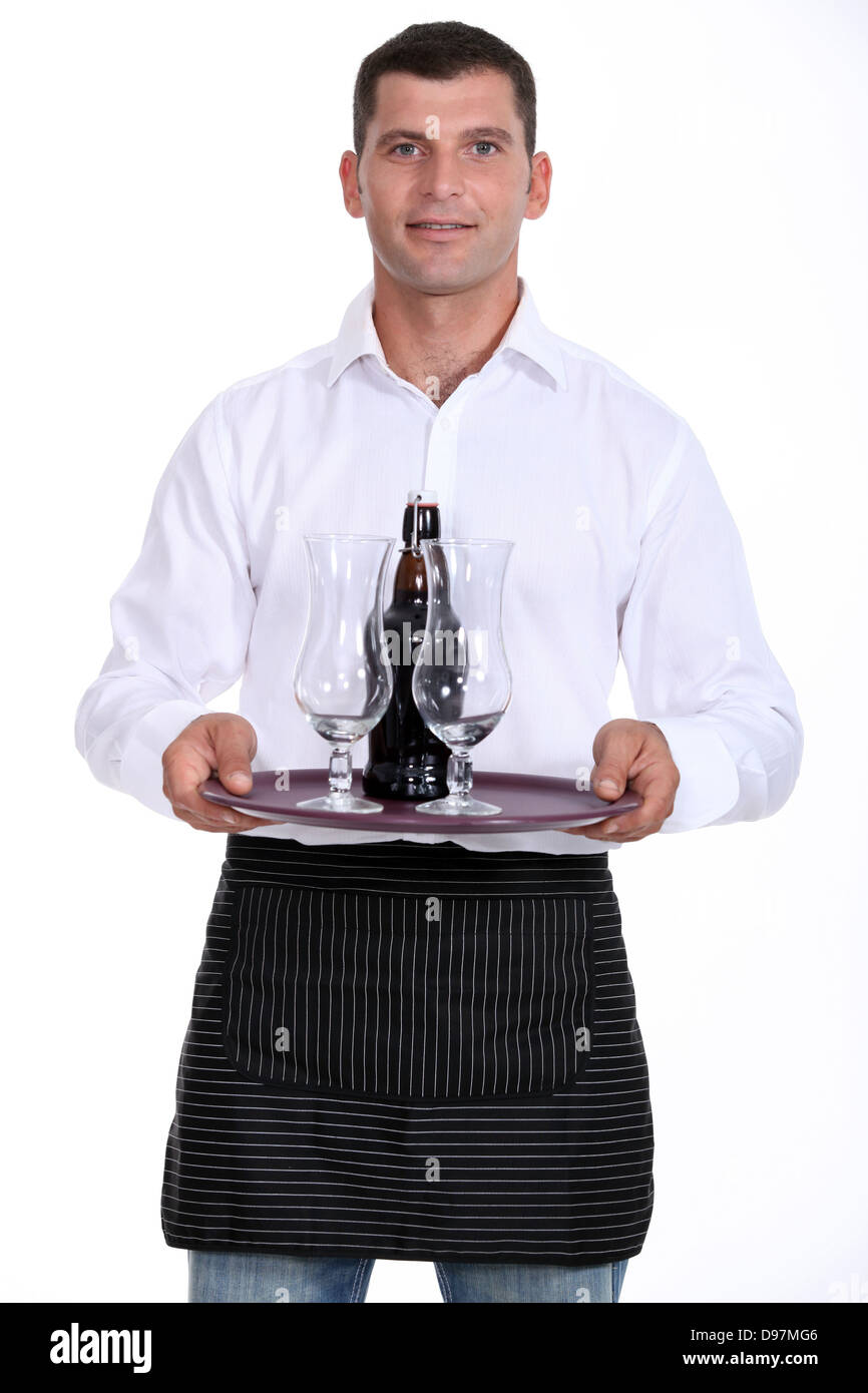 Waiter carrying tray of beer Stock Photo Alamy