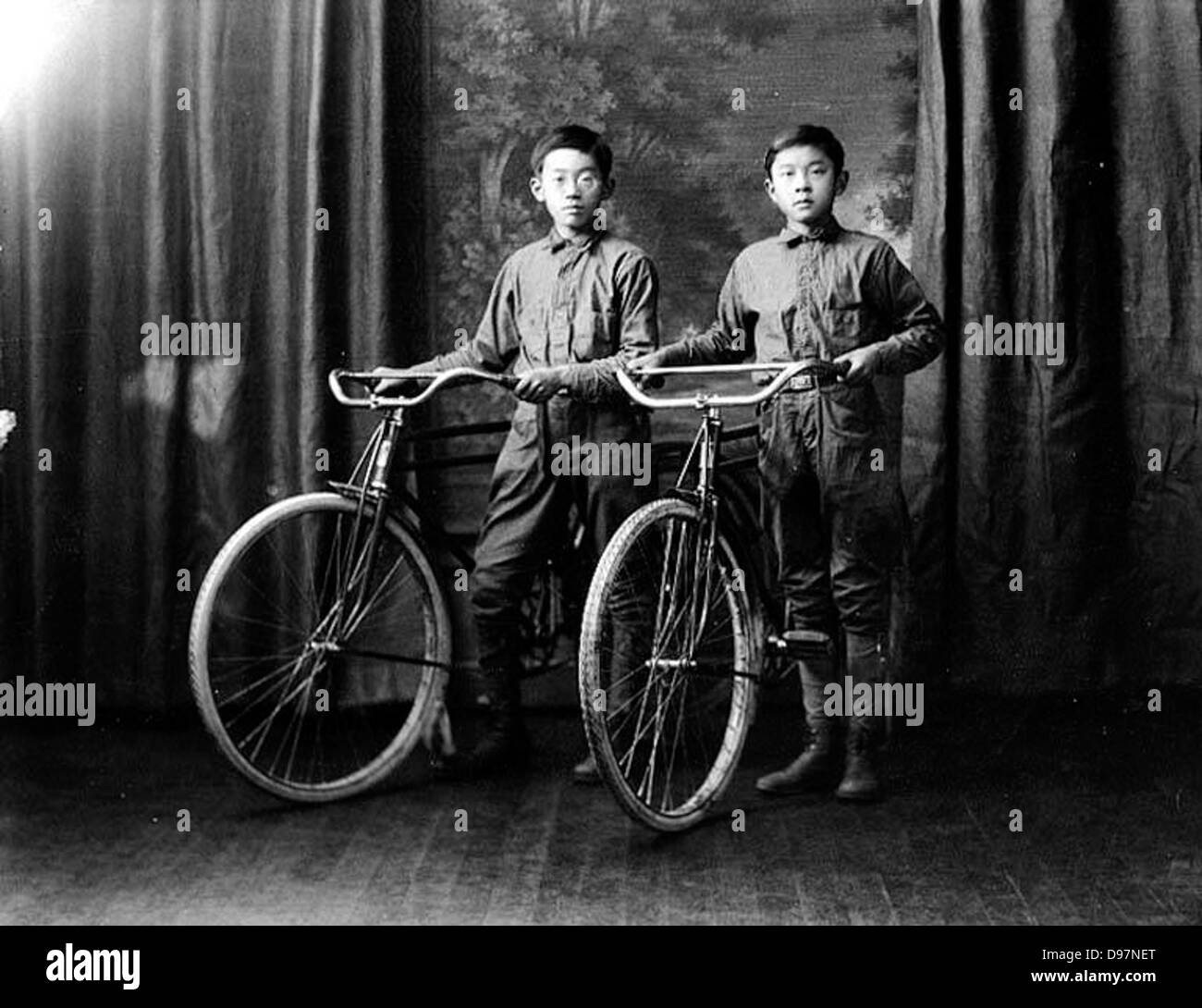 Japanese American boys and their bicycles Stock Photo