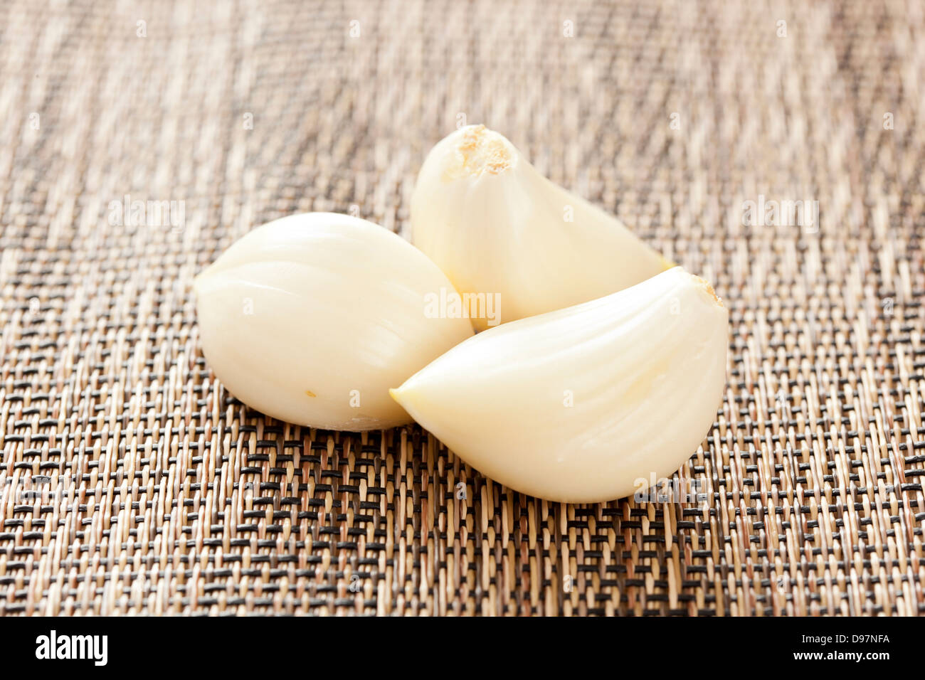 Fresh Organic Garlic Cloves on a background Stock Photo - Alamy