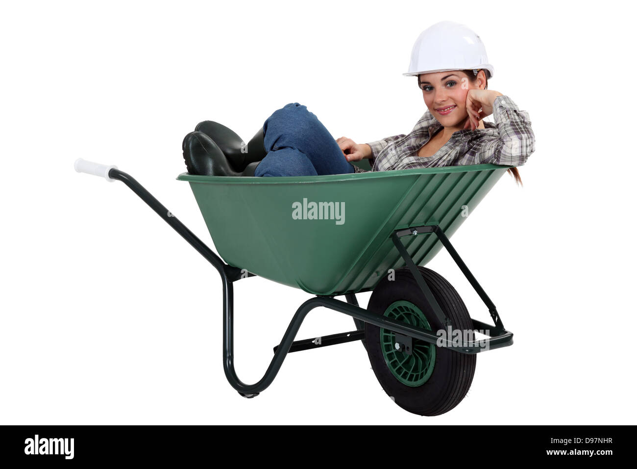 Tradesman in a wheelbarrow Stock Photo - Alamy