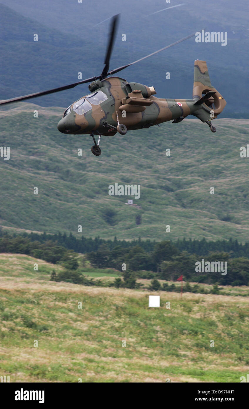 A helicopter of the Japan Ground SelfDefense Forces takes part in a