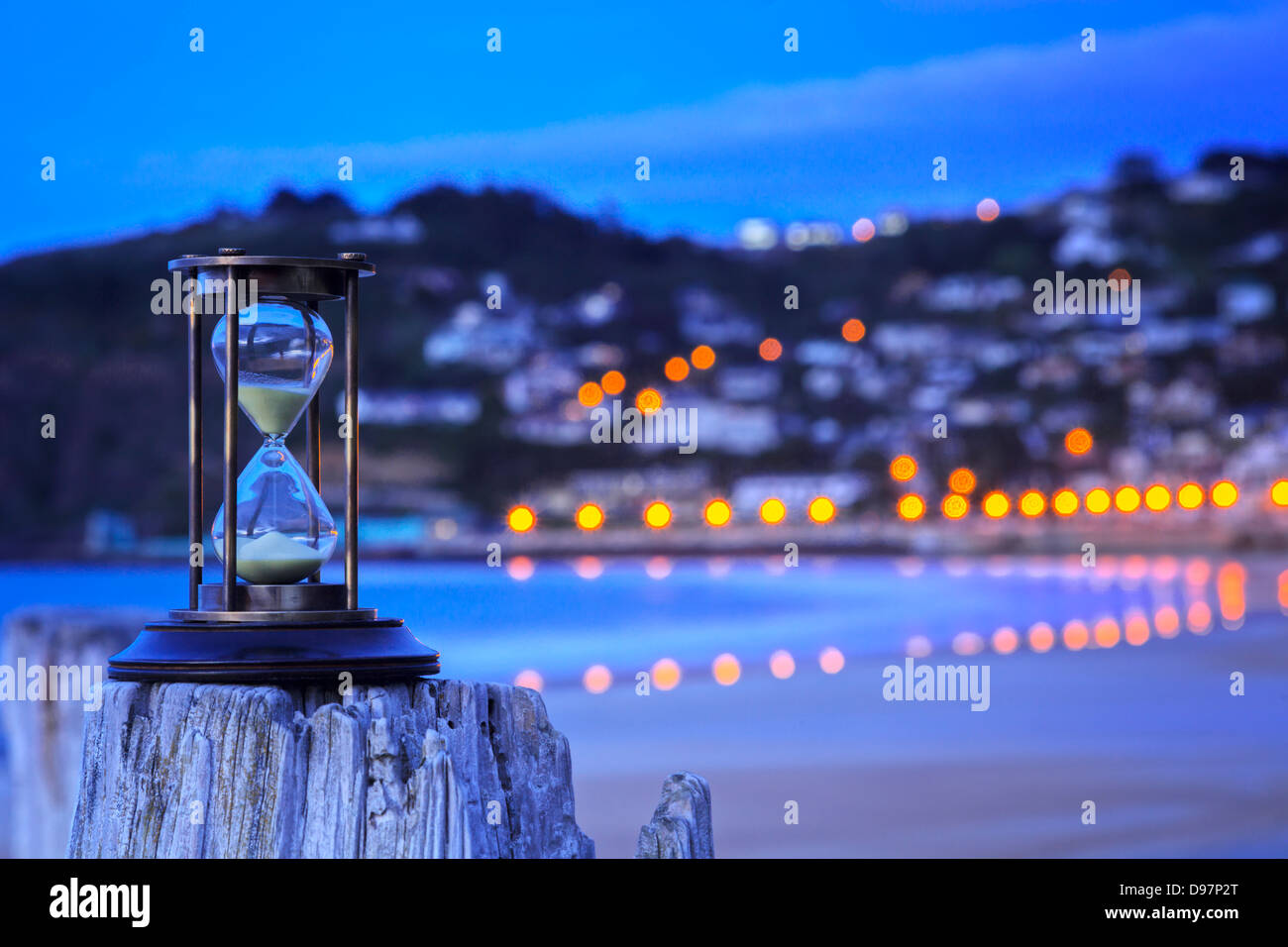 Hourglass Outdoors and Street Lights hourglass on an old post at a