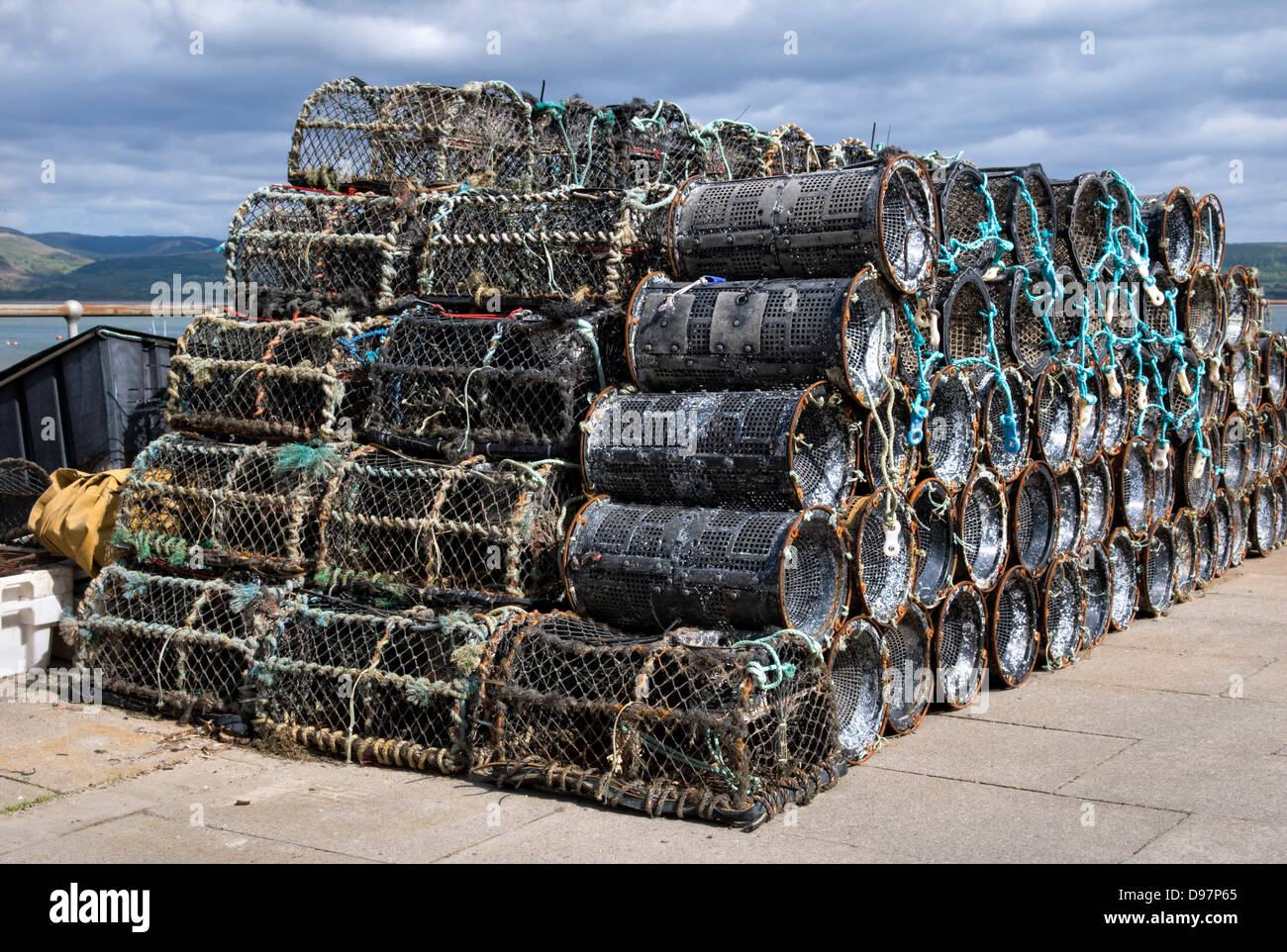 Pile of old lobster and shrimping pots at Aberdovey, Gwynedd, Wales Stock Photo