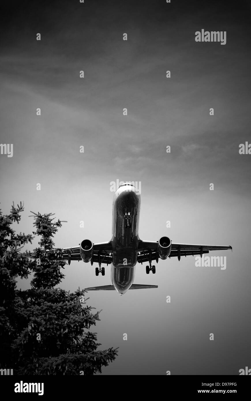 An airplane lands at Berlin Tegel Stock Photo