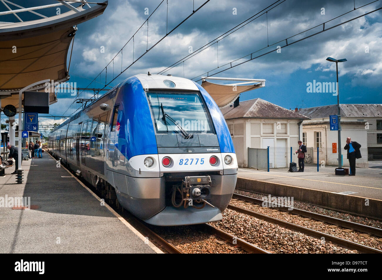 French Bombardier commuter train arriving at station - France. Stock Photo