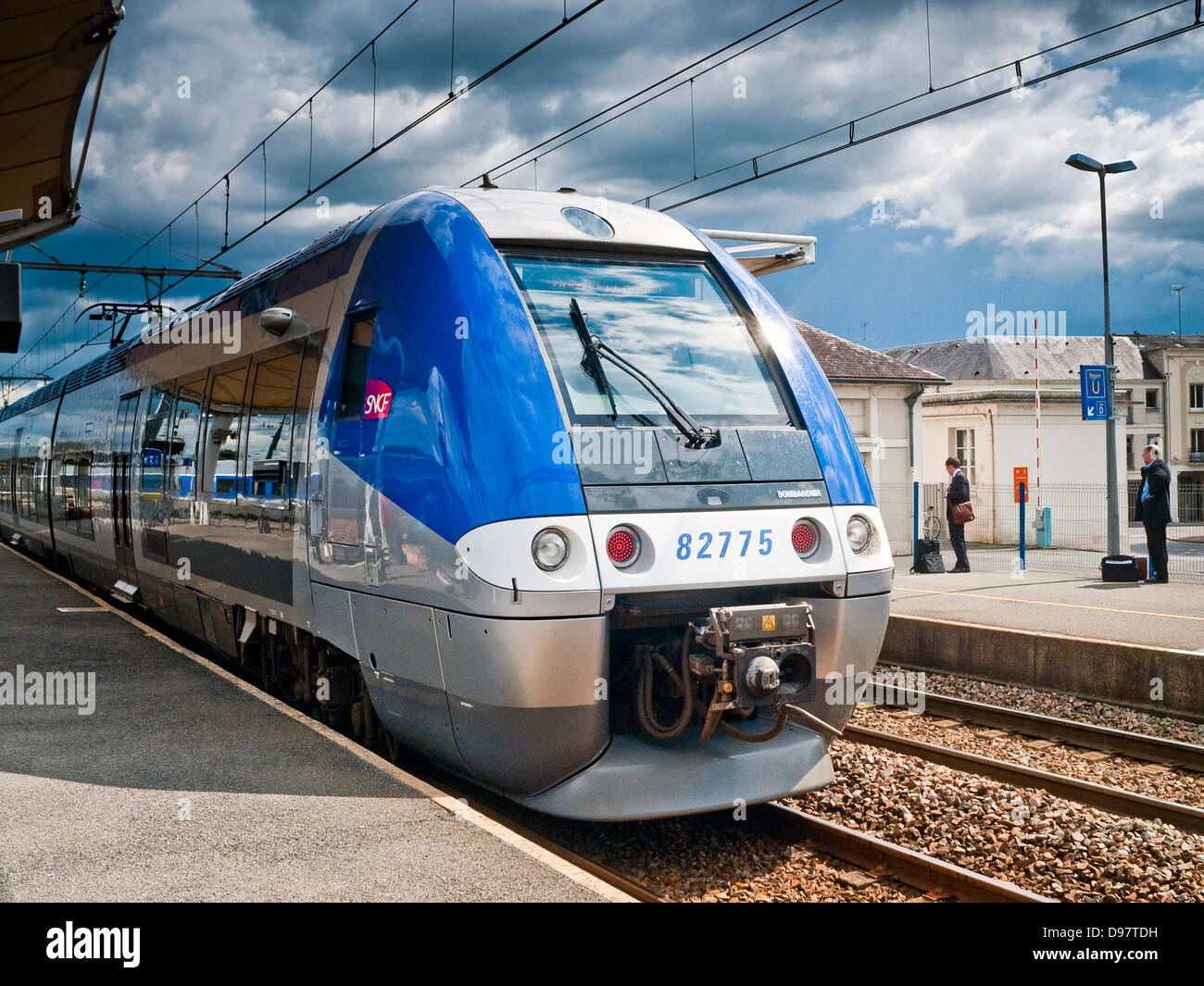 French Bombardier commuter train arriving at station - France. Stock Photo