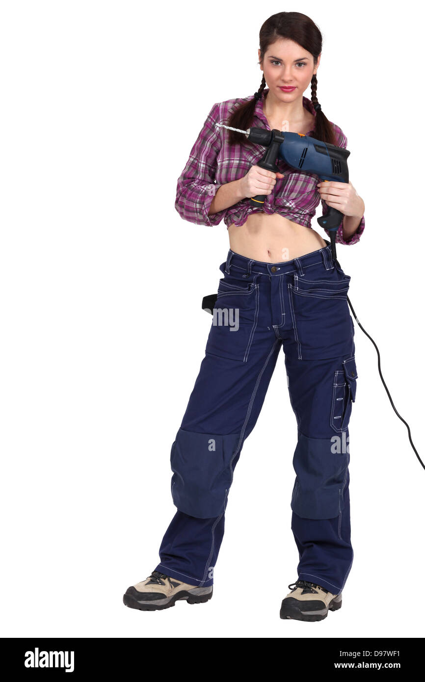 Woman with a powerdrill Stock Photo