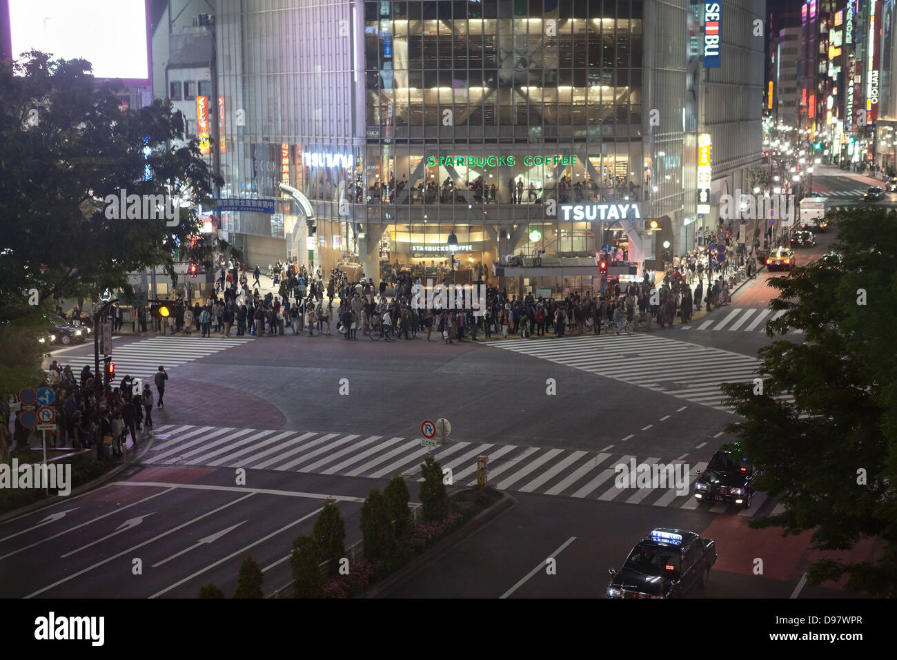 Shibuya Crossing is famous place for scramble crossing in Tokyo city, Japan. Night view. Empty intersection Stock Photo