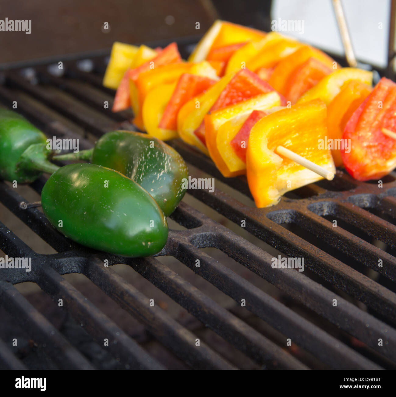 Grilled jalapeños Stock Photo