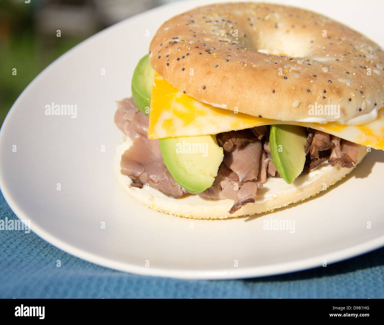 Roast beef and avocado bagel sandwich Stock Photo Alamy