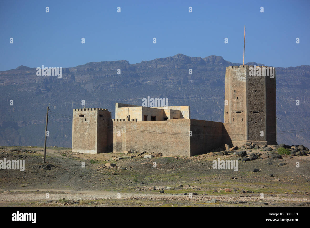 Military castle with Mirbat in the south of Oman Stock Photo