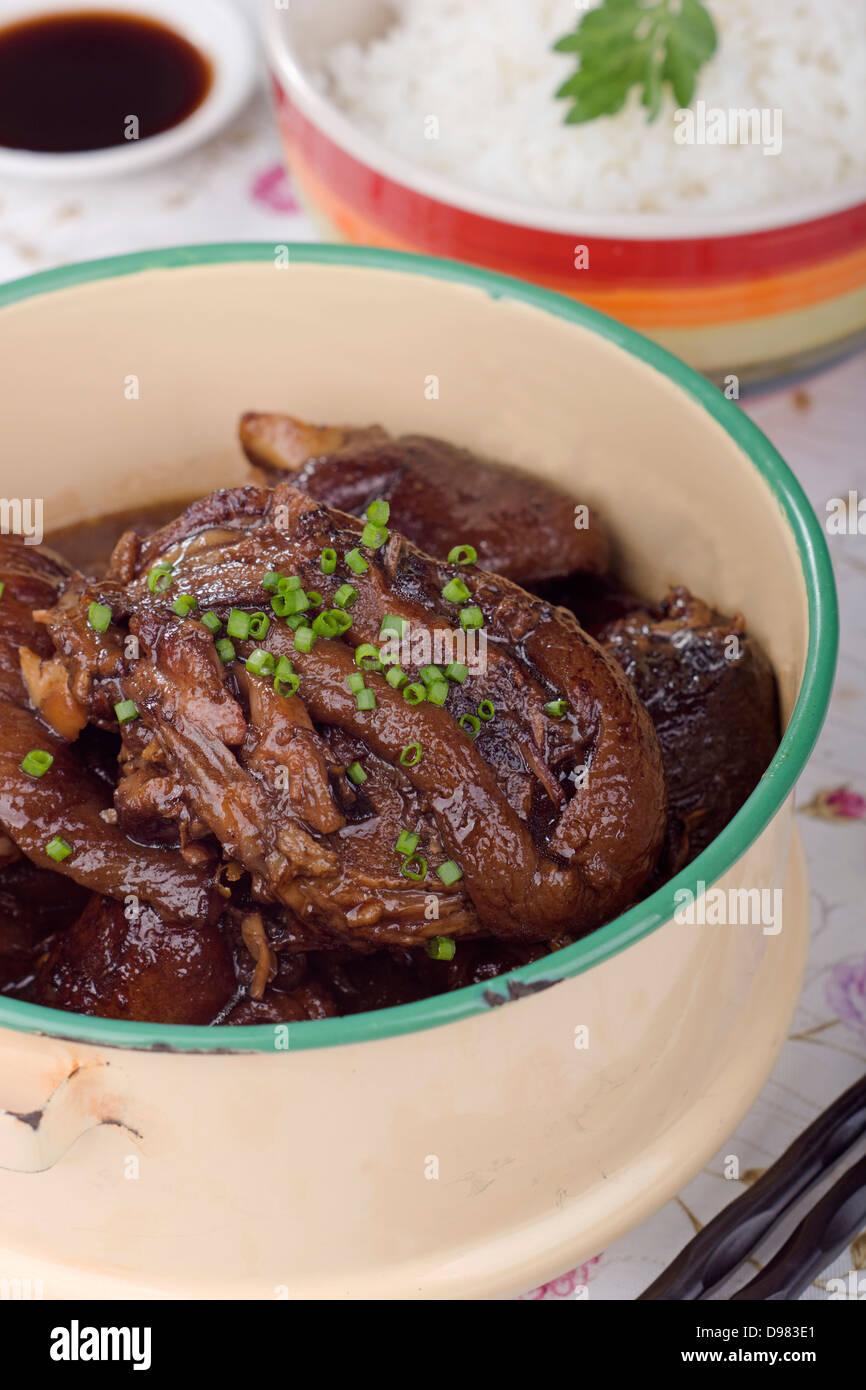 Braised Pork Trotters in Black Soy Sauce Stock Photo