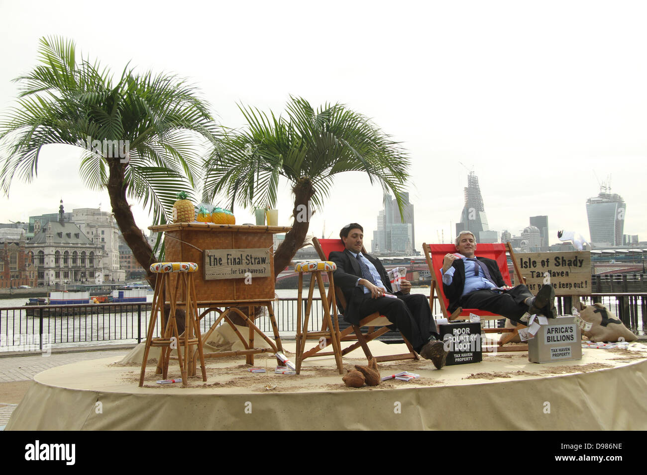 London 14 June 2013. The Isle of Shady, a pop-up tax haven on London’s South Bank, was set up by ‘Enough Food IF’ campaigners calling for tax justice as world leaders prepare to meet for the Open for Growth and G8 summit.Credit David Mbiyu/Alamy Live News Stock Photo