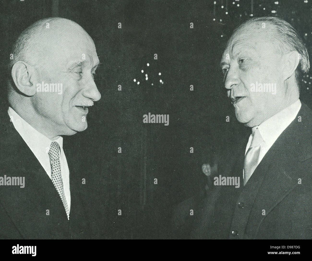 Konrad Adenauer (1876-1967), German Chancellor, right, and Robert Schuman (1886-1863), French Foreign Minister meeting, 27 May 1952. Stock Photo