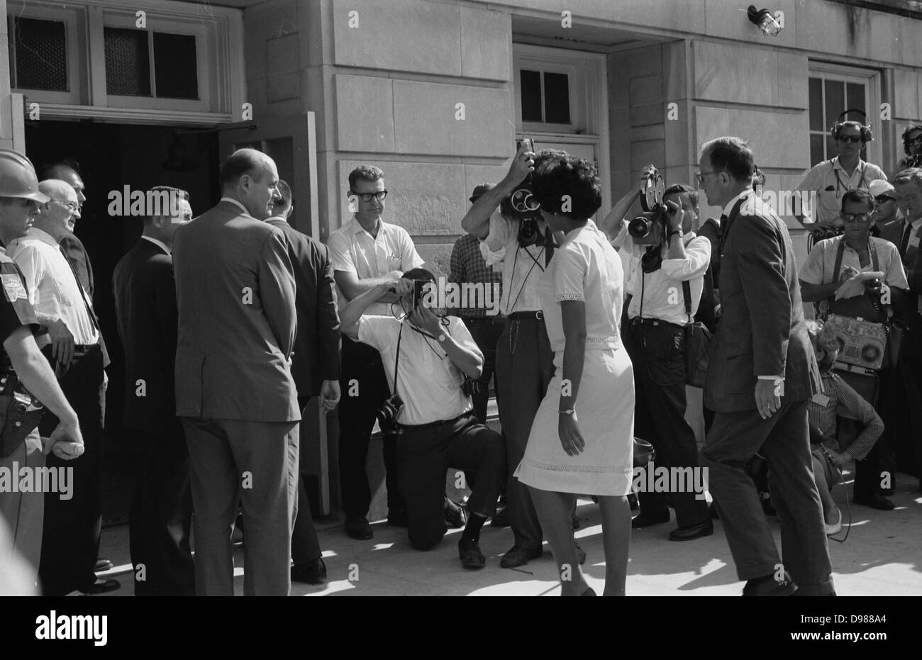 Vivian Malone entering Foster Auditorium to register for classes at the University of Alabama. One of the first African Americans to attend the university. Photographer: Warren K.Leffler. Stock Photo