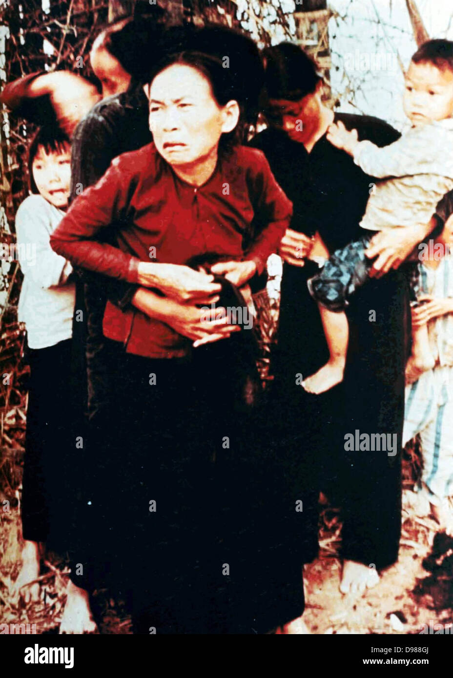 The My Lai Massacre, the mass murder of 347 to 504 unarmed citizens of the Republic of Vietnam (South Vietnam), almost entirely civilians and the majority of them women and children, perpetrated by US Army forces on March 16 1968. Women and children in My Lai, Vietnam, shortly before US soldiers shot and killed them.s Source Report of Army review into My Lai incident, book 6, 14 March 1970. Stock Photo