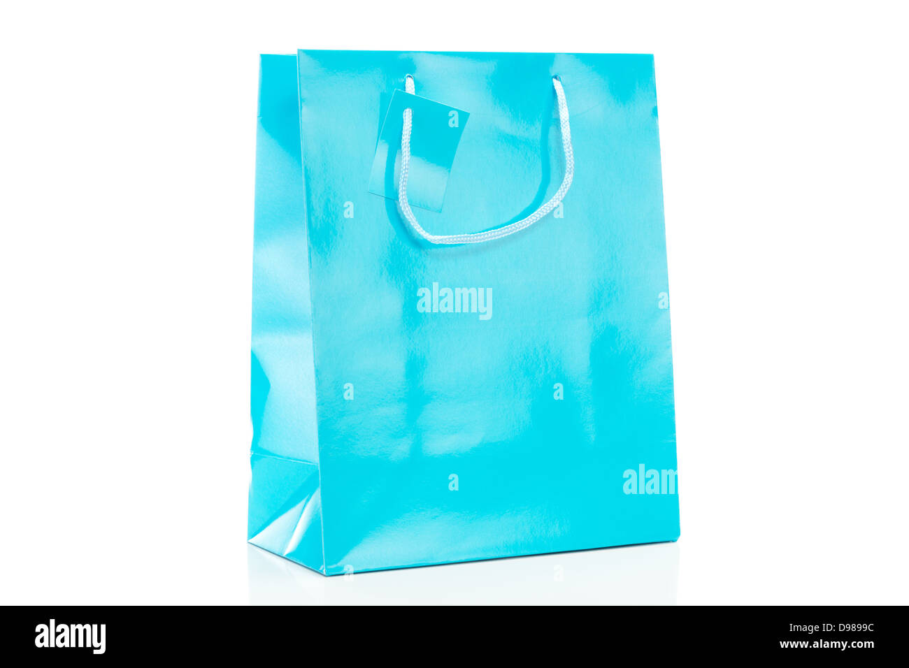 Single blue shopping bag on white background Stock Photo - Alamy