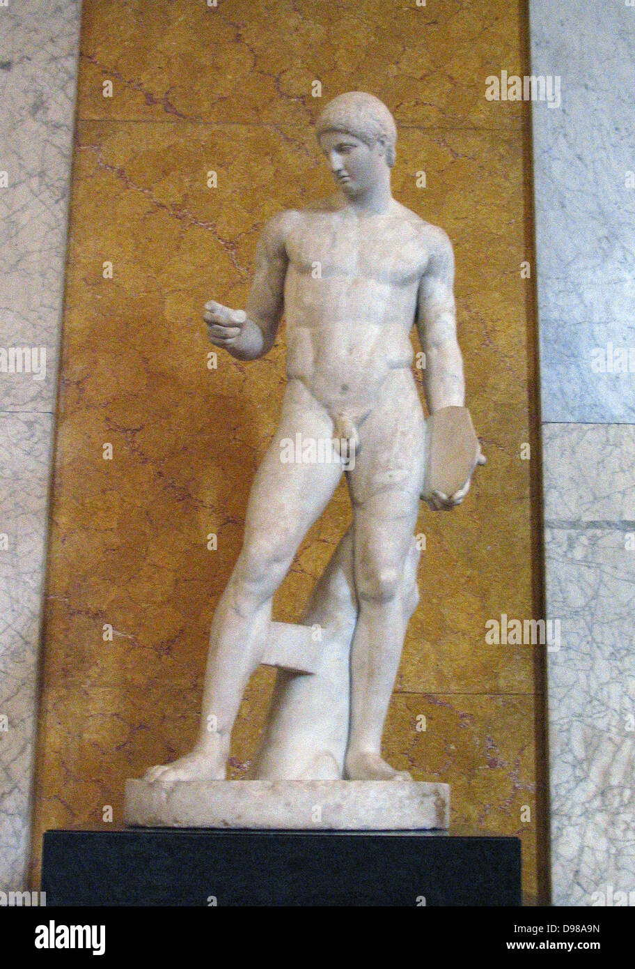 Discophoros, Marble Sculpture from British Museum.The Discophoros, also spelled Discophorus, was a bronze sculpture by the classical Greek sculptor Polyclitus, creator of the Doryphoros and Diadumenos, and its many Roman marble copies. Like the Doryphoros and Diadumenos, it was created as an example of Polyclitus's 'canon' of the ideal human form in sculpture. Stock Photo