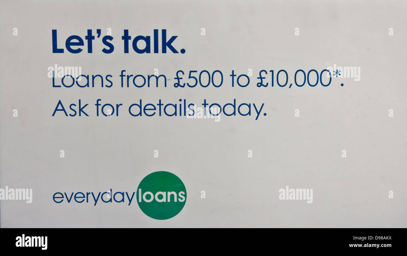 Advertisement for loans in bank window Stock Photo
