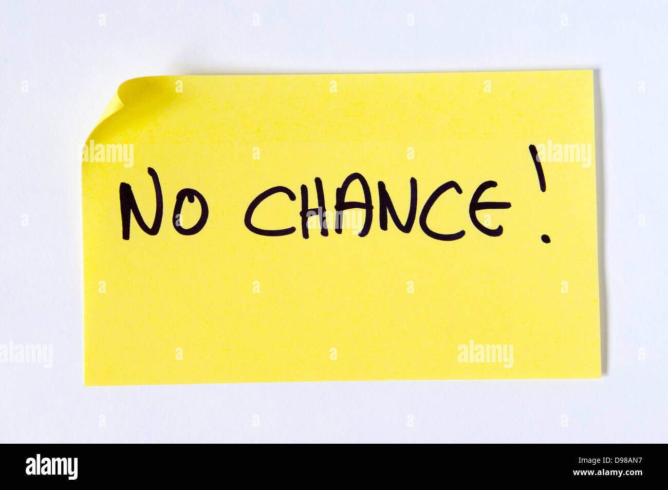 No Chance! Written in capital letters on a yellow post it note Stock Photo
