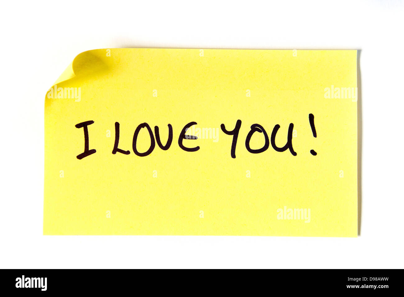 I love you! Written in capital letters on a yellow post it note. Stock Photo