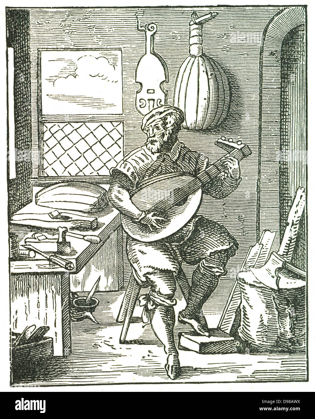 Lute Maker in his workshop. Woodcut by Jost Amman (1535-1591). Stock Photo