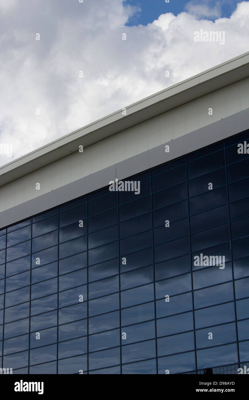 An office building and section of cloudy sky Stock Photo - Alamy