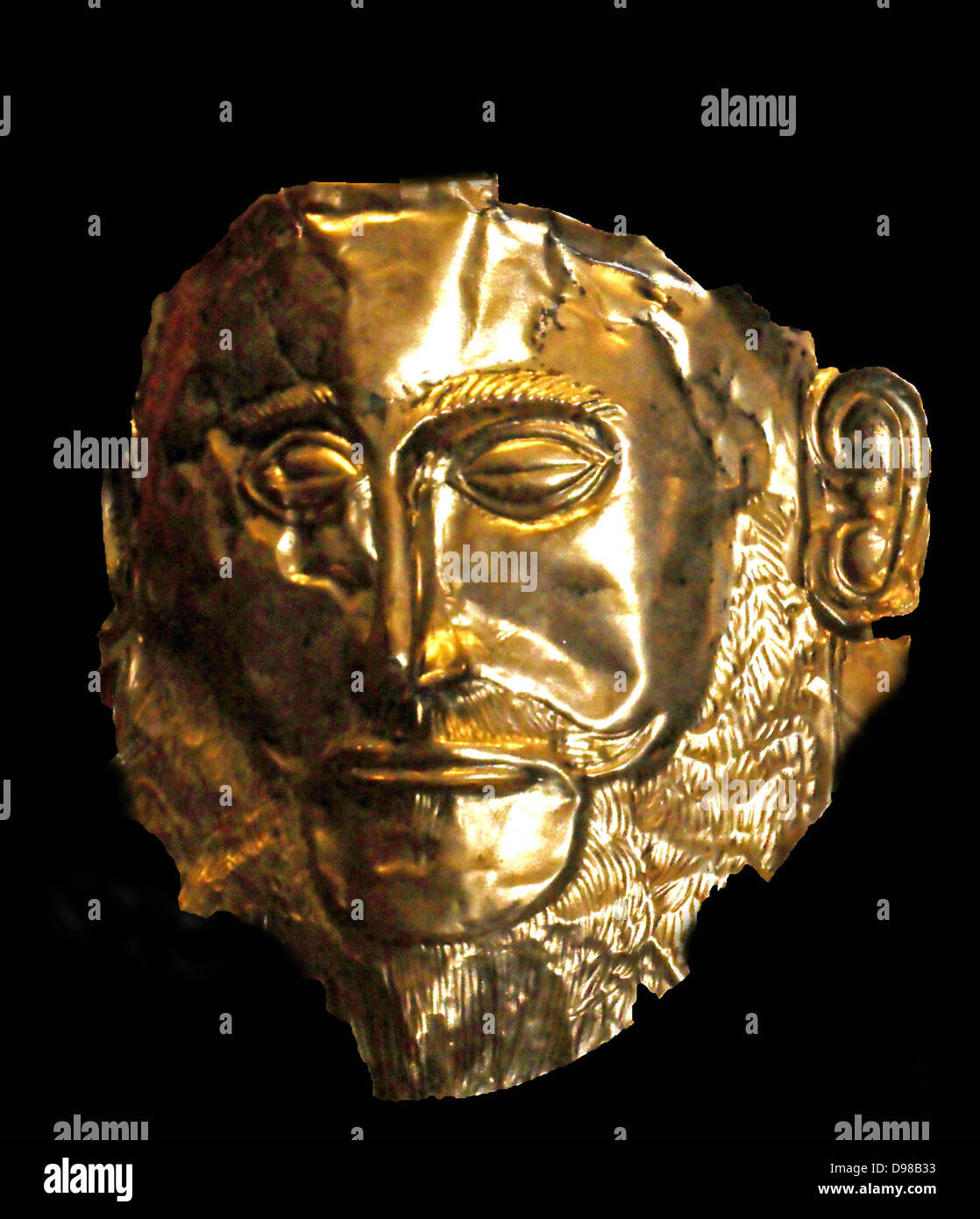 The Mask of Agamemnon is an artefact discovered at Mycenae in 1876 by Heinrich Schliemann. The mask is a gold funeral mask. Schliemann believed that he had discovered the body of the legendary Greek leader Agamemnon. today archaeological research suggests the mask is from 1550–1500 B.C.E Stock Photo