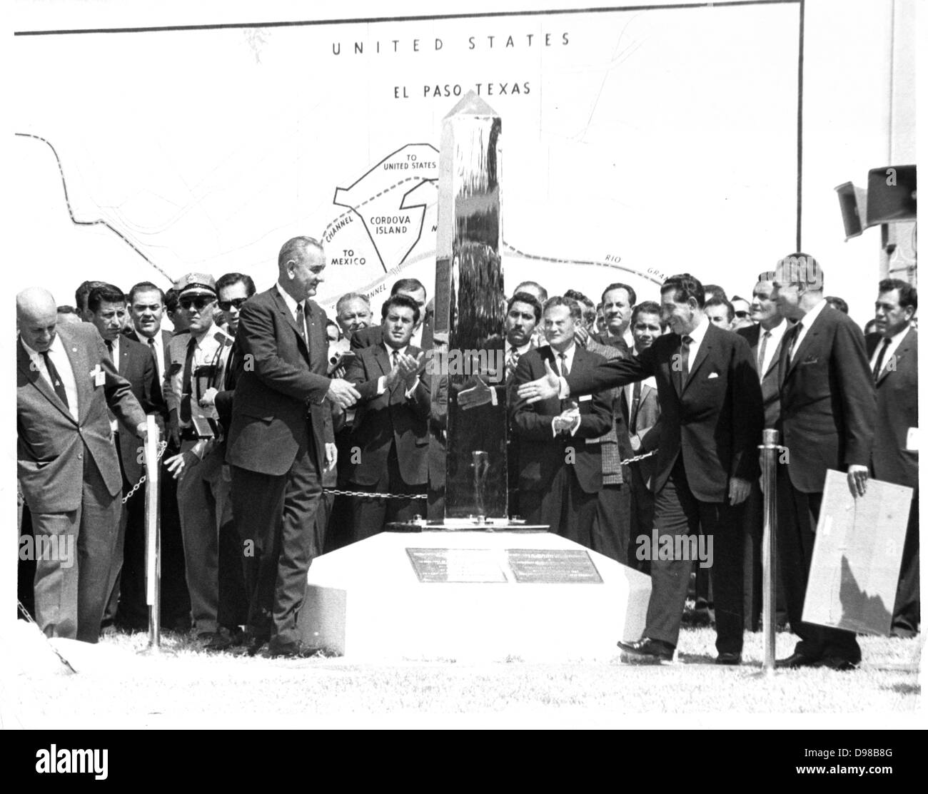 Lyndon B Johnson (1908-1973) President of the United States of America and the Mexican President Adolfo Lopez signalling the peaceful end of the Chamizal Issue. Mateos (1909-1969) unveiling the new boundary marker In 1968, Congress established Chamizal National Memorial to commemorate the Chamizal Convention (treaty) of 1963. Stock Photo