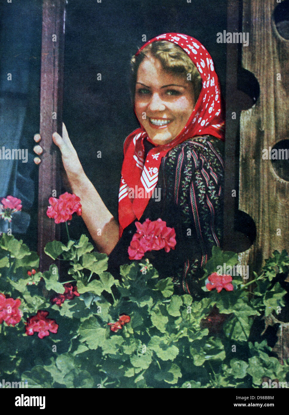 World War II 1939-1945:  Smiling, pretty young girl next door, soldier's sweetheart.  From 'Signal', August 1942, German propaganda magazine produced by the Wehrmacht. Stock Photo