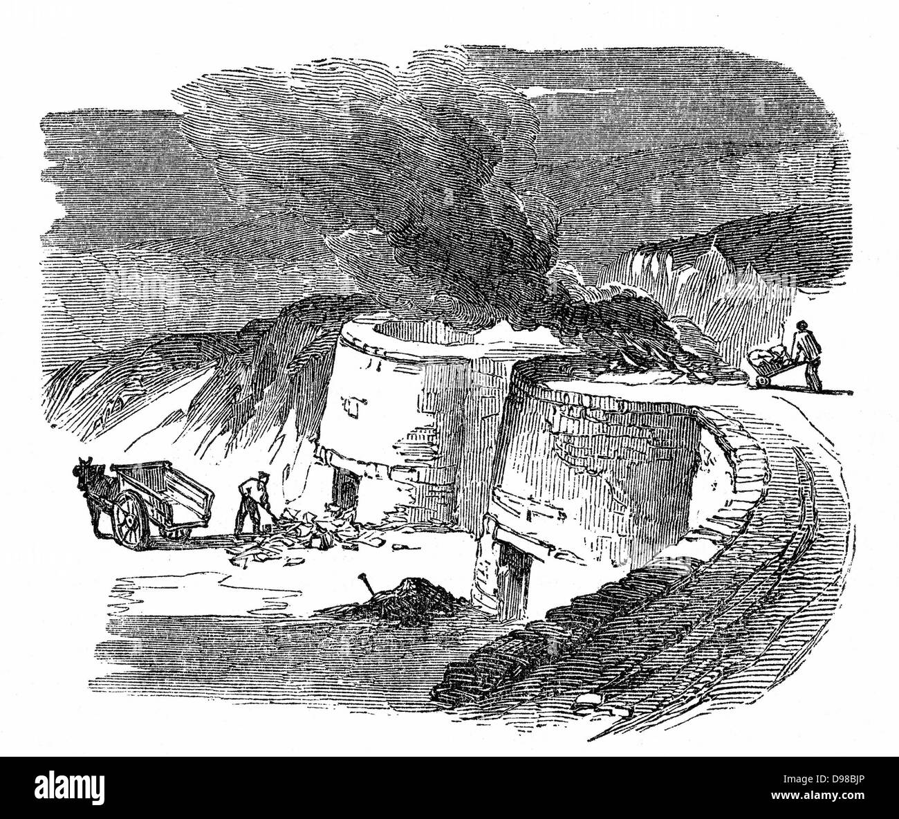 Lime Kilns: burning limestone to produce lime for cement and mortar, and for agricultural use. Wood engraving 1872 Stock Photo