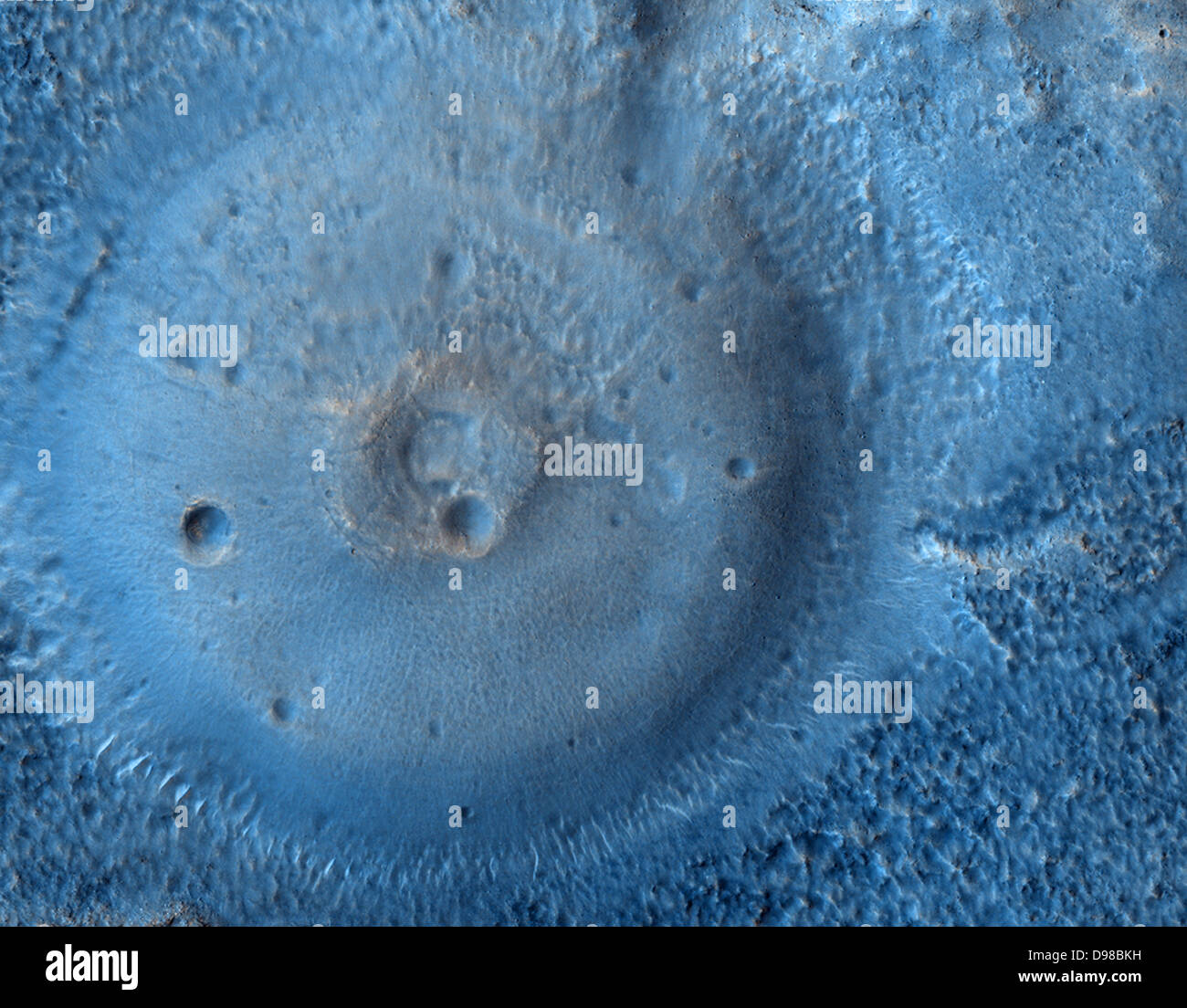Possible Mud Volcanoes on Mars: Is this a mud volcano on Mars? If so, could it be dredging up Martian microbes? This strange Stock Photo