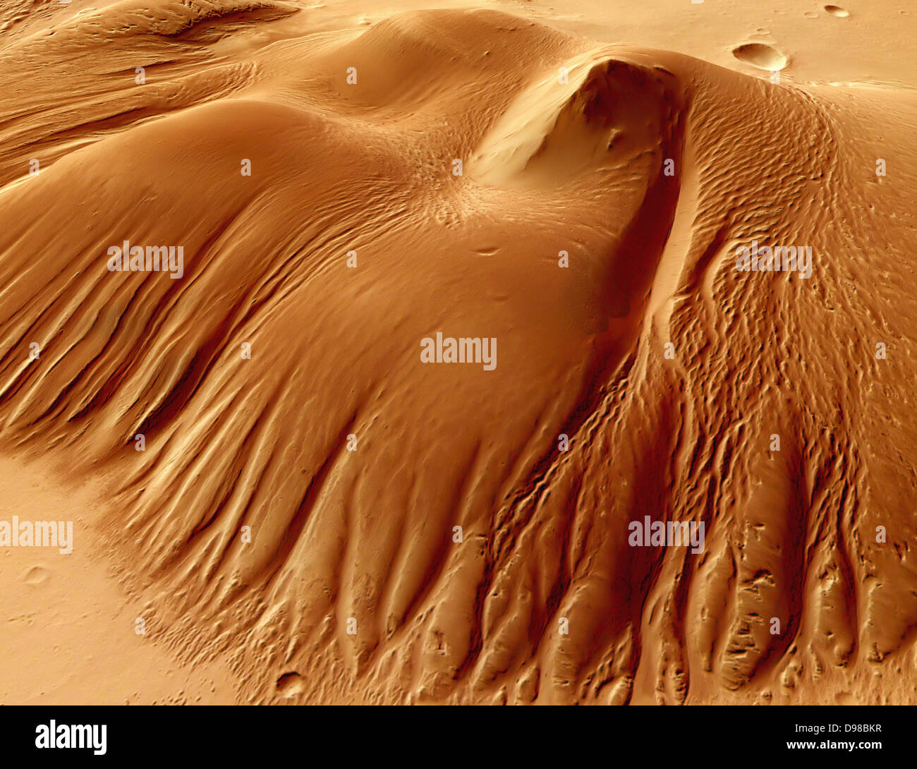 Mountain in the Nicholson crater. Perspective colour view of a 55 kilometre long and 37 kilometre wide massif in the middle of the Nicholson crater - detailed view. North is at the top. Nicholson is a crater on Mars centred at 0.1° N and 164.5° W. It is 62 miles wide (100 km), and located in the Memnonia quadrangle. Nicholson is a good marker for the equator as it sits almost directly on the Martian equator. It is named after Seth Barnes Nicholson, an American astronomer. Stock Photo