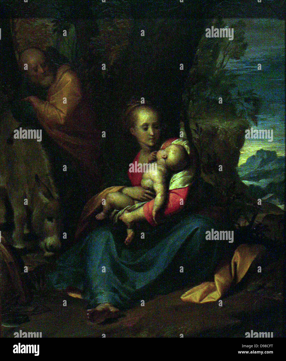 Perhaps by Giovanni Battista Crespi II Cerano (about 1575/76-1632) The Rest on the Flight into Egypt, oil on copper.  In a colourful landscape setting, Mary nurses the child Jesus.  The Holy Family fled to Egypt to escape Herod's command that all new-born boys should be killed.  Painted on copper around 1600. Stock Photo