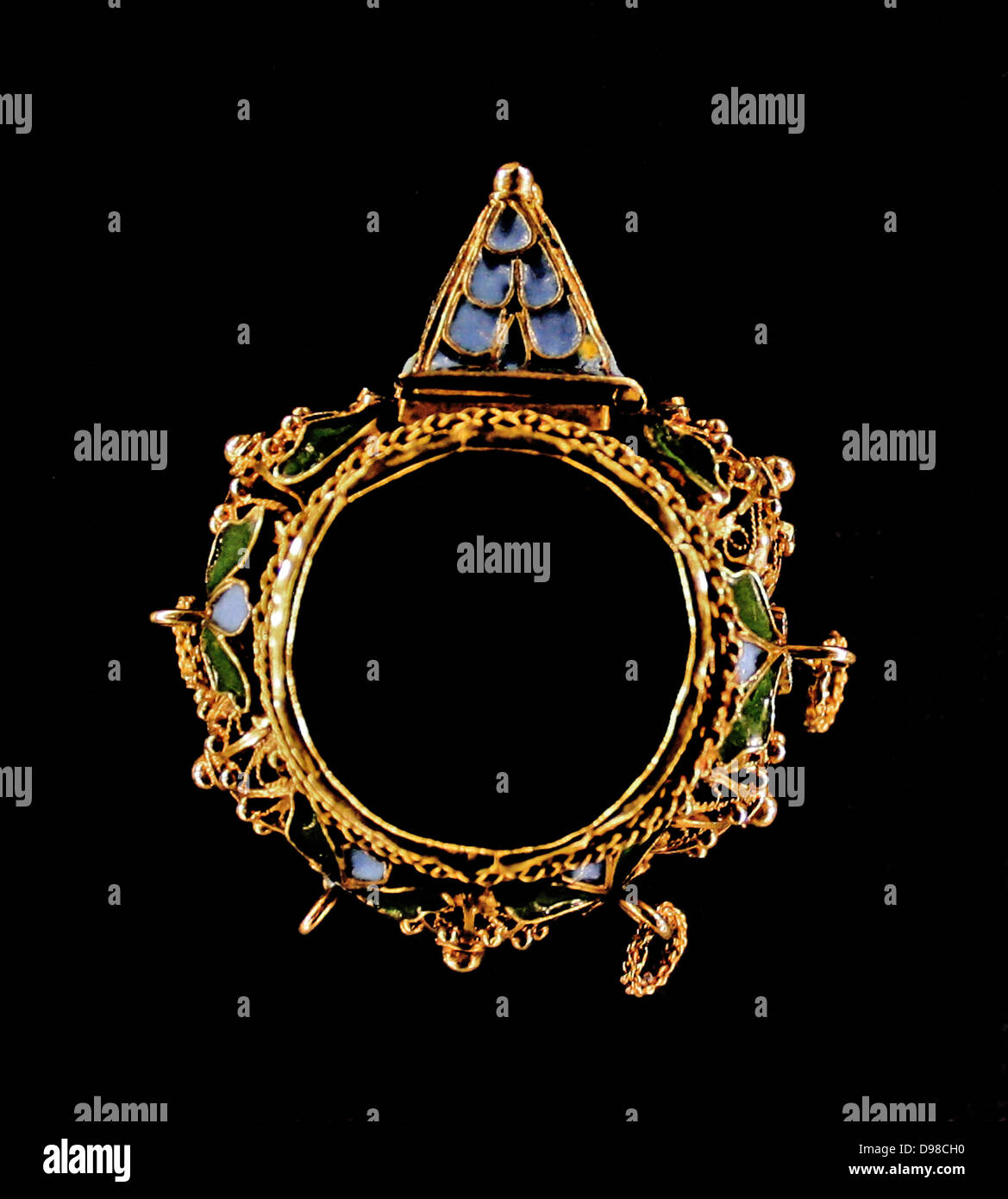 Gold ring, the bezel set with a crystal engraved with a shield of arms opening on a hinge showing a compass and dial.  Gold Stock Photo