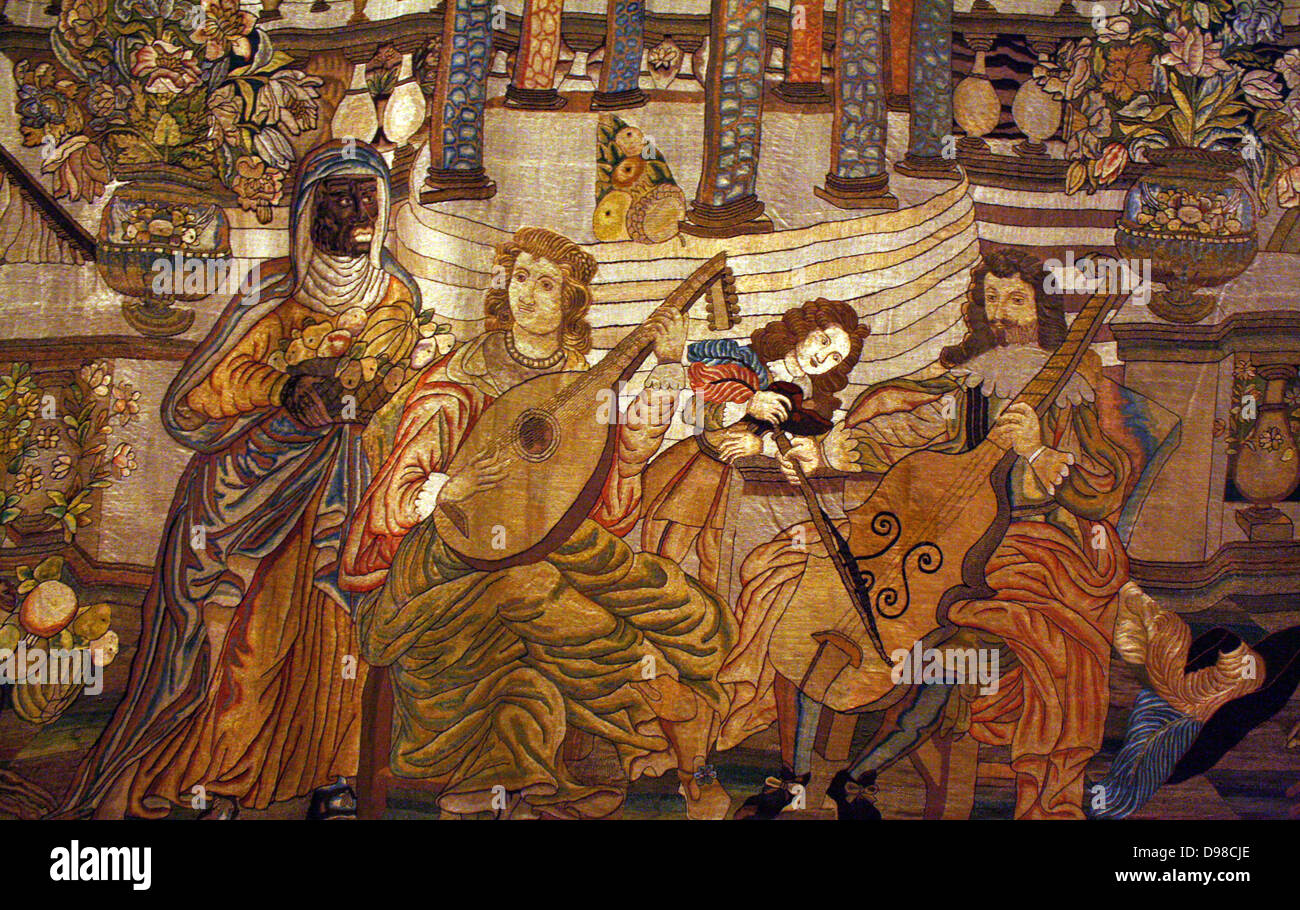 A well-dressed man and woman make music in a fanciful setting of a noble residence with a formal garden.  Servants attend them, and animals including a pet monkey and a peacock are also prominent, evoking the wealth and taste for luxury of the group.  The harmony of music can symbolize love and fidelity but the sounds and pleasures of music fade, as do fruit and flowers.  The embroidery, which may be Spanish, once had a decorative border that probably included the client's coat of arms.  Music was an important part of social life. Stock Photo