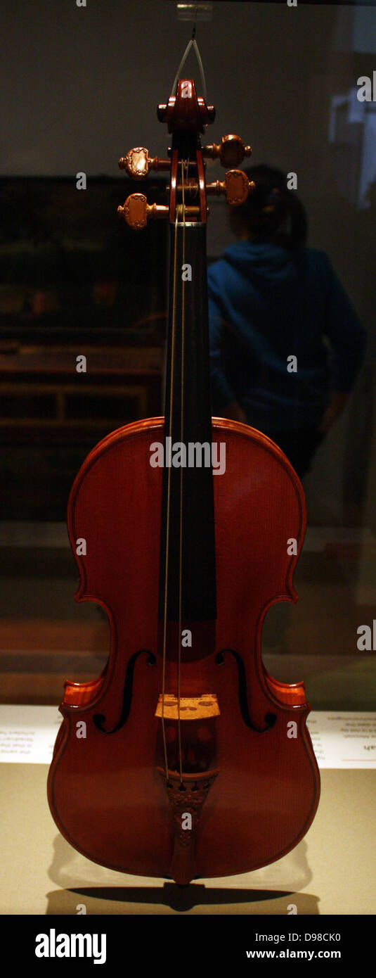 Messiah.  This violin dates from Stradivari's 'Golden Period' of about 1700-1720.  He was then at the height of his powers and had developed an ideal size and shape for making instruments.  This violin owes its fame chiefly to its fresh appearance.  Because it has been owned mostly by collectors and not by professional players, it has not been exposed to the wear and tear of frequent playing. Stock Photo