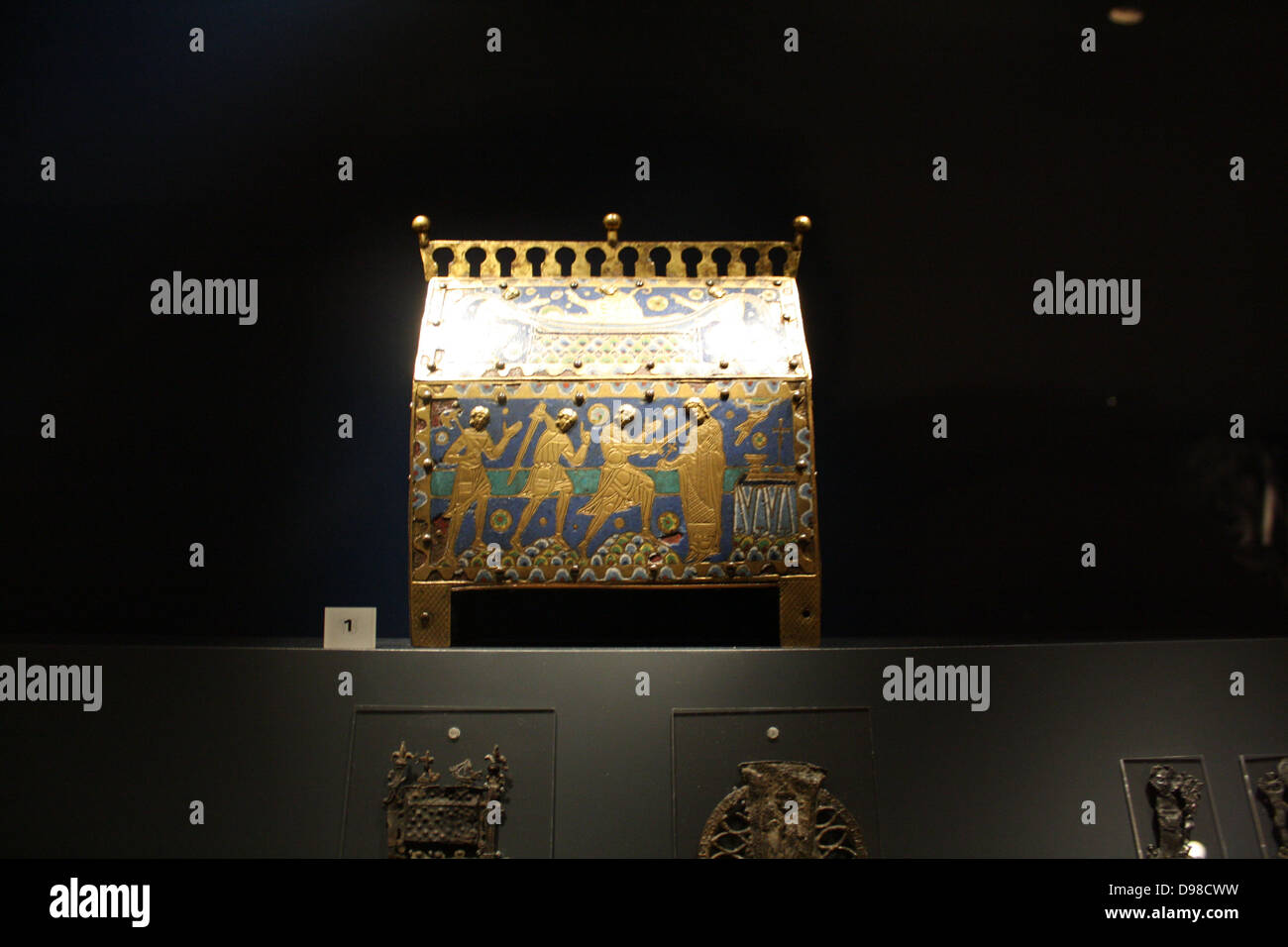 Reliquary casket of St. Thomas Becket. Gilt and copper alloy with enamel set on wood. Made around 1200 at Limoges, France. Depicts death and burial of the Saint. Thomas Becket (1118 – 29 December 1170), later also known as Thomas à Becket, was Archbishop of Canterbury from 1162 until his murder in 1170. Stock Photo
