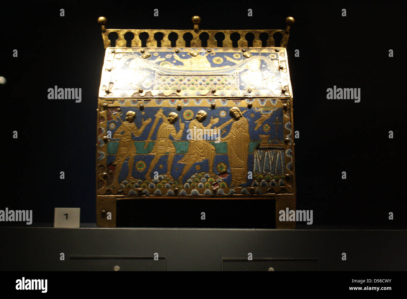 Reliquary casket of St. Thomas Becket. Gilt and copper alloy with enamel set on wood. Made around 1200 at Limoges, France. Depicts death and burial of the Saint. Thomas Becket (1118 – 29 December 1170), later also known as Thomas à Becket, was Archbishop of Canterbury from 1162 until his murder in 1170. Stock Photo