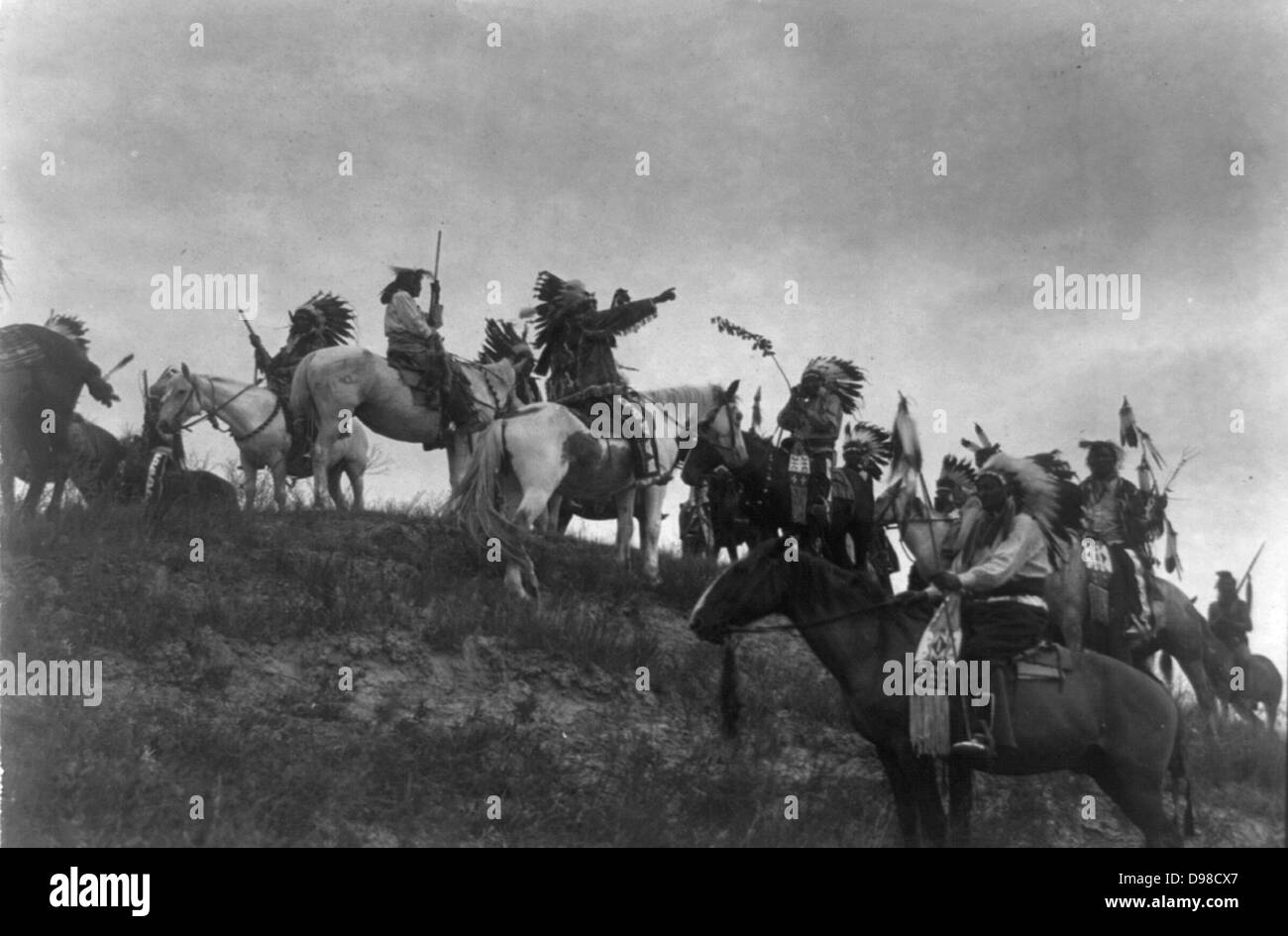 Native American Indians on horseback on hill, c1907. Photograph by Edward Curtis (1868-1952). Stock Photo