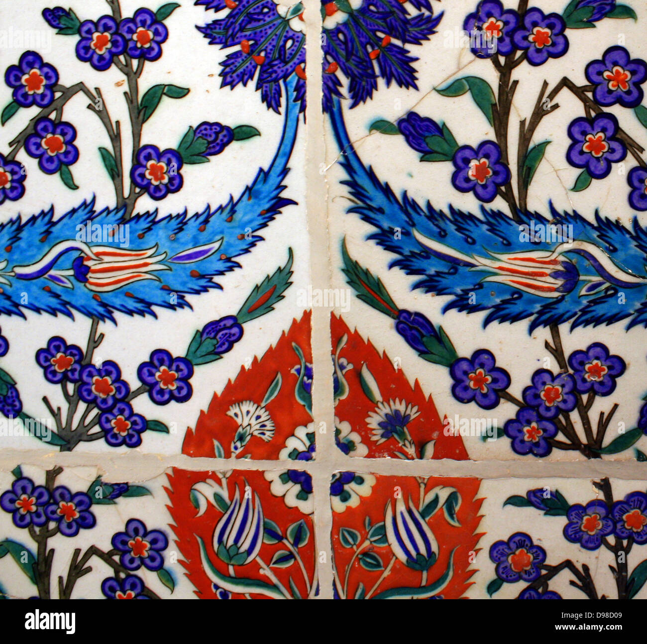 Tiles from Turkey 1550-1600 1.Pair of tiles with peonies and serrated leaves. Turkey about 1550-1560. Fritware with polychrome underglaze painting.  2. Set of four tiles with tulips, prunus sprays and serrated leaves.  Turkey 1550-1600.  Fritware, with polychrome underglaze painting. Stock Photo