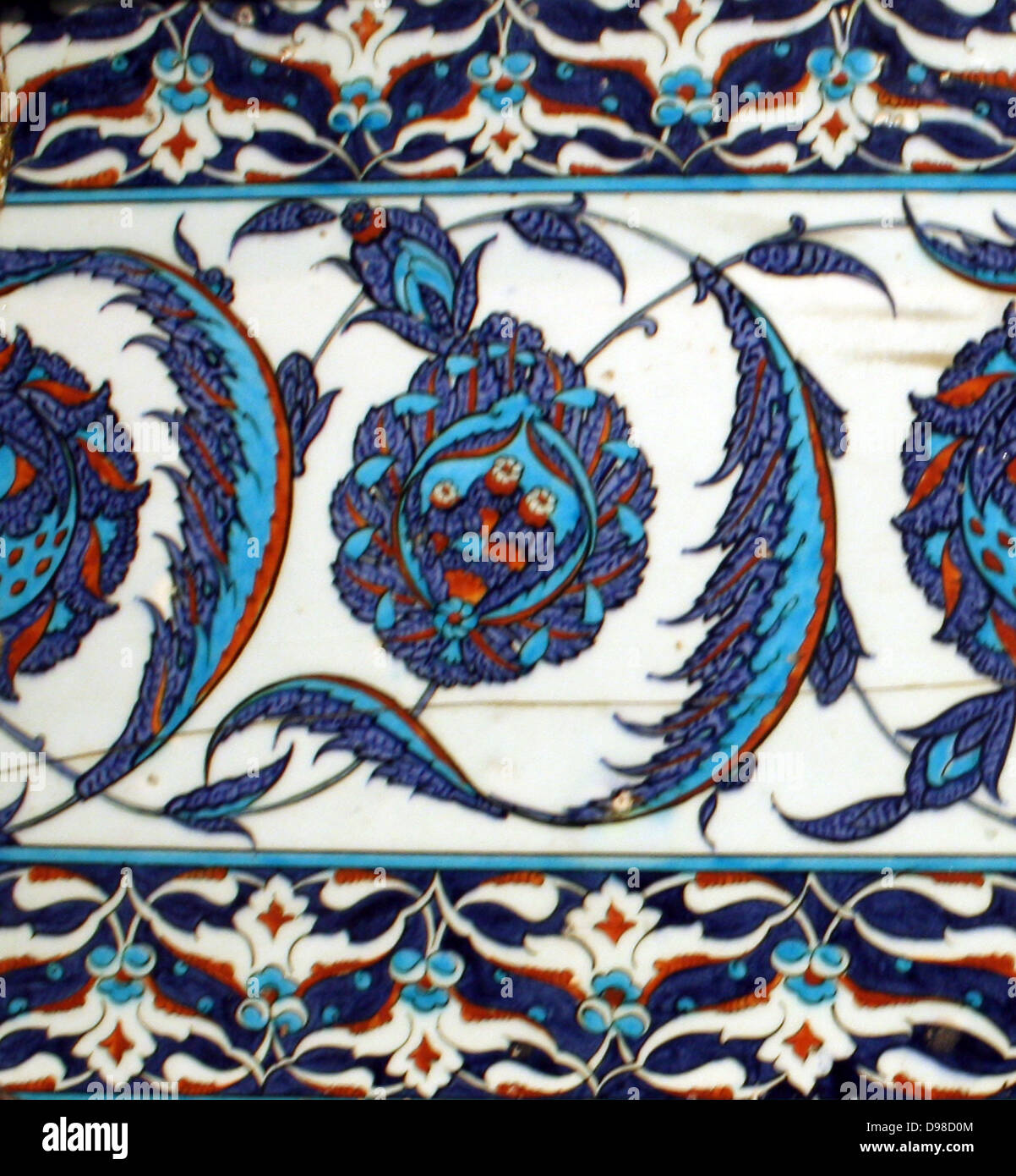 Tiles from Turkey 1550-1600 1.Pair of tiles with peonies and serrated leaves. Turkey about 1550-1560. Fritware with polychrome underglaze painting.  2. Set of four tiles with tulips, prunus sprays and serrated leaves.  Turkey 1550-1600.  Fritware, with polychrome underglaze painting. Stock Photo