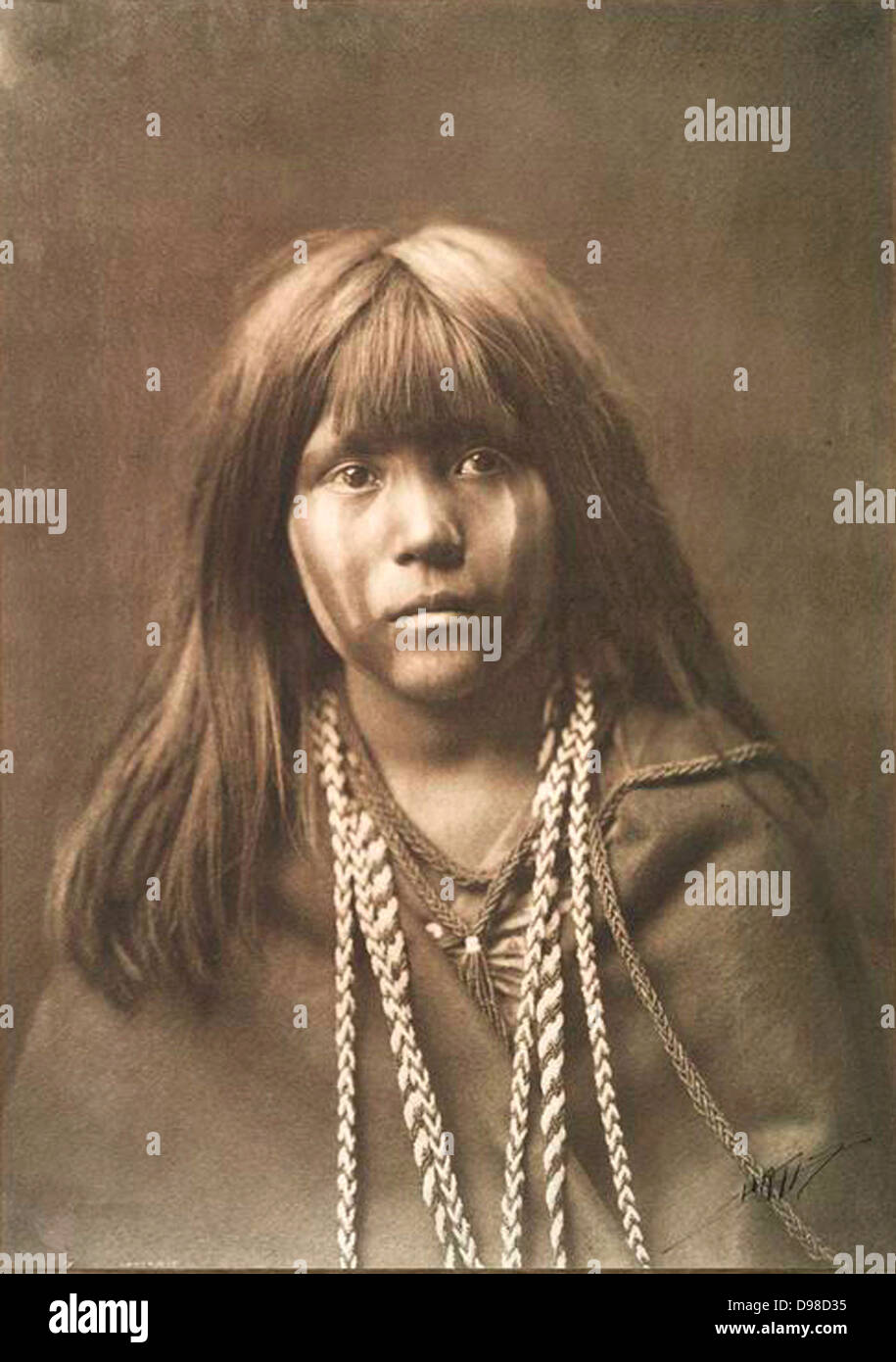 Native American Indian girl. Photograph by Edward Curtis (1868-1952). Stock Photo