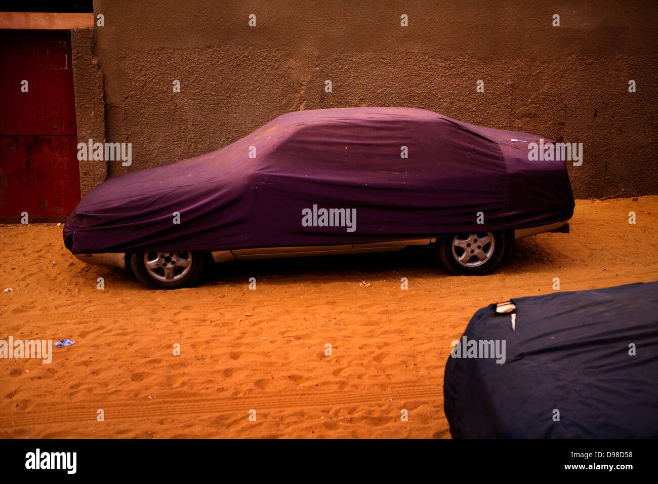 Covered car on street, Dakar Stock Photo
