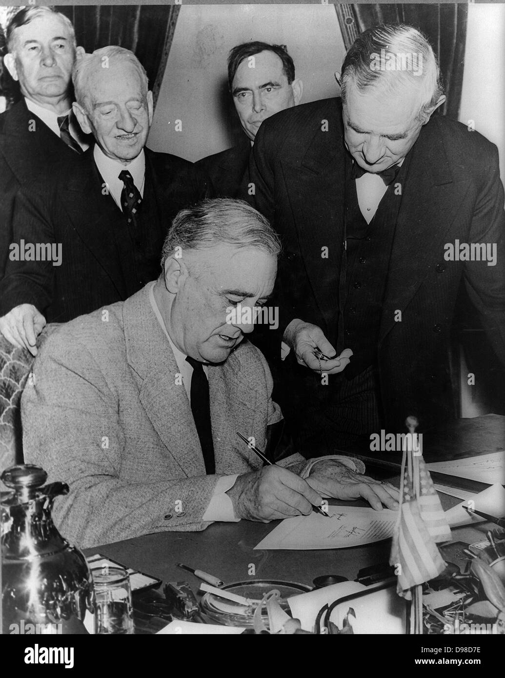 Franklin Delano Roosevelt (1882-1945) 32nd President of the United States of America 1933-1945, signing the declaration of war against Germany, 11 December 1941. Stock Photo