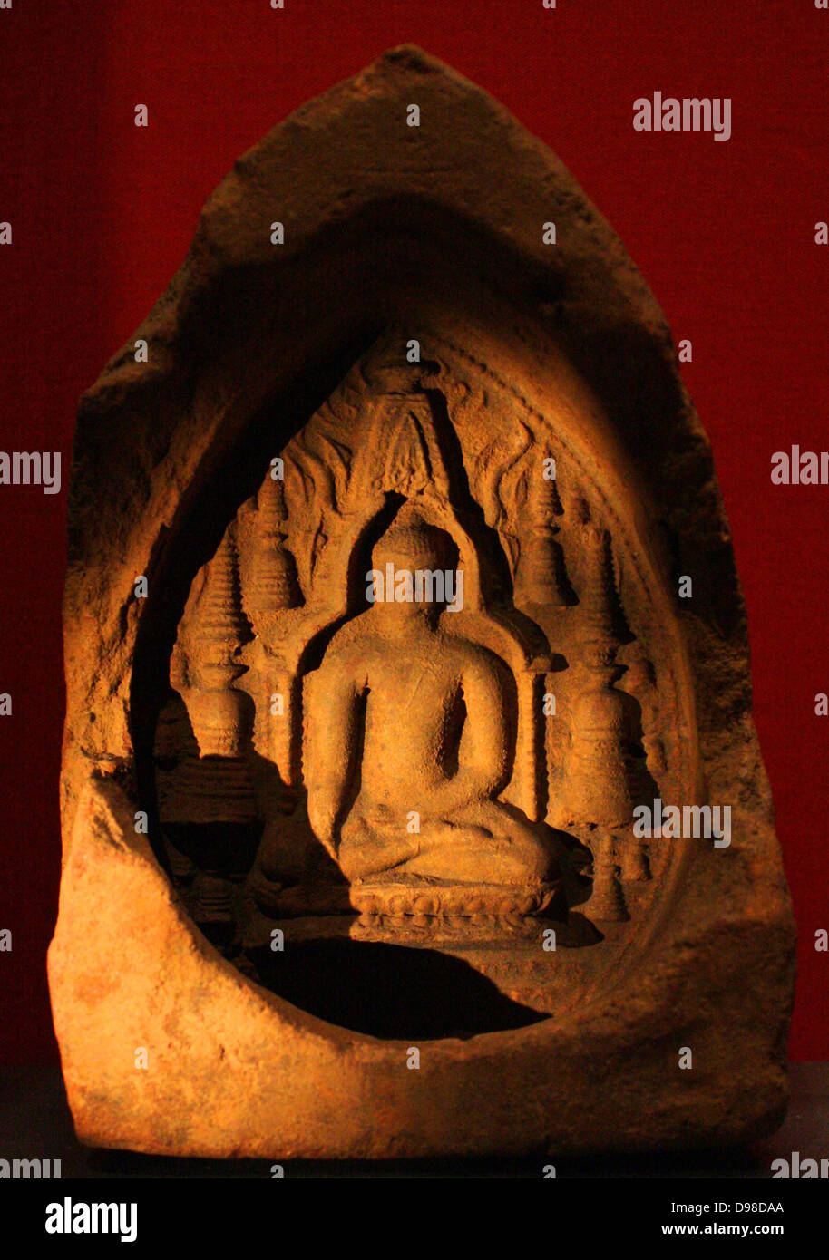 Buddha in the Mahabodhi temple, terracotta plaque, eastern India, 1000