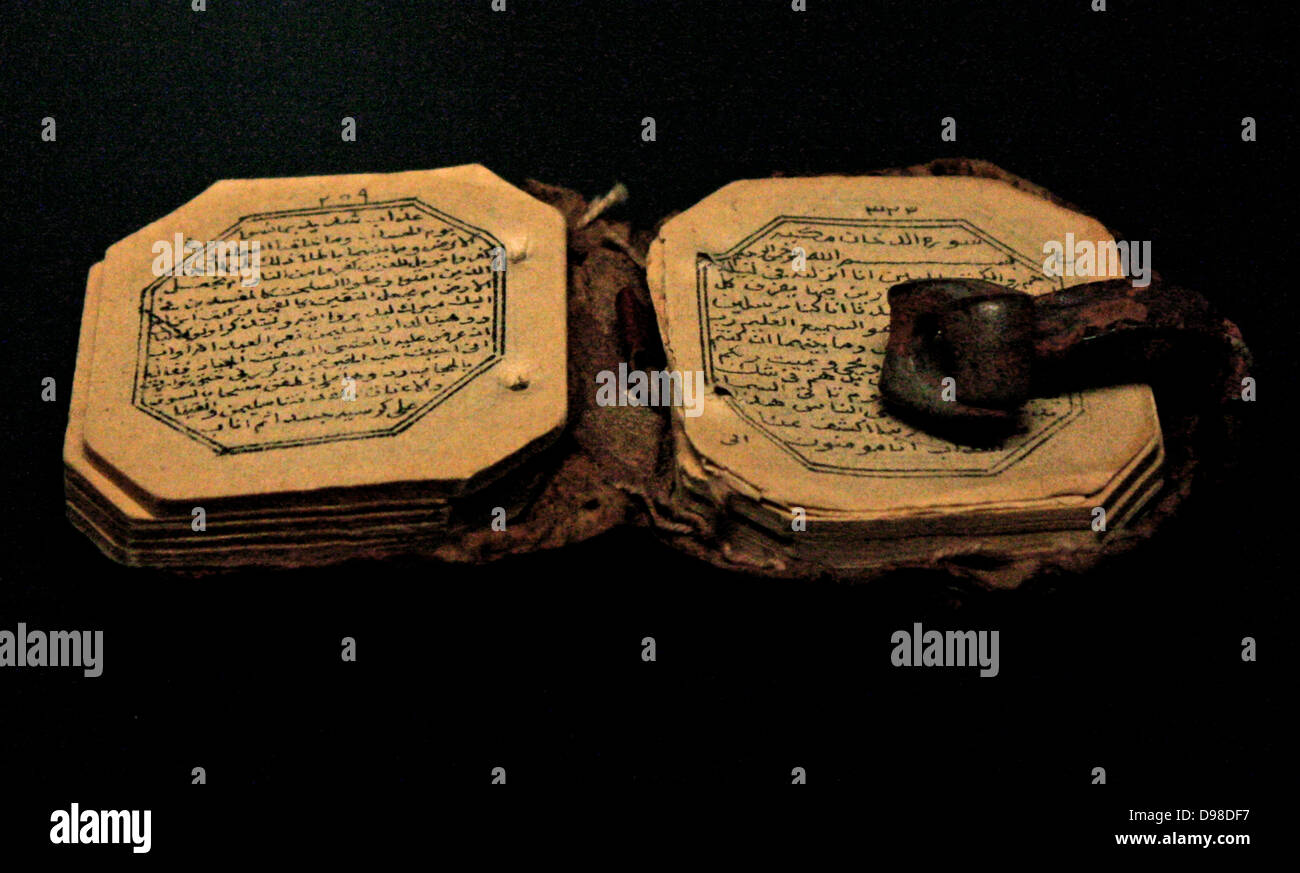 Miniature Qur'an, dated 1309 H/AD 1889-90, Iran, Arabic using ghubar script on paper.  Miniature copies of the Qur'an may be carried by pilgrims. Stock Photo